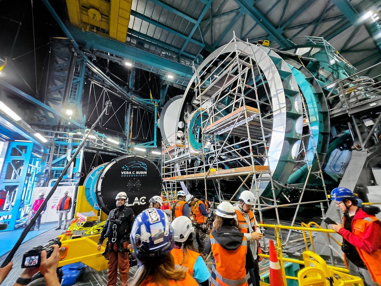 <p>The <a href="https://rubinobservatory.org/">NSF–DOE Vera C. Rubin Observatory</a> team installing the <a href="https://rubinobservatory.org/explore/how-rubin-works/technology/camera">LSST Camera</a> on the <a href="https://noirlab.edu/public/programs/vera-c-rubin-observatory/simonyi-survey-telescope/">Simonyi Survey Telescope</a> in March 2025.</p>