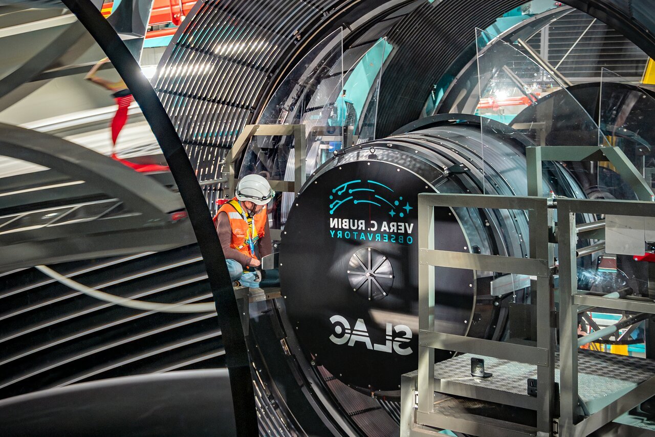 <p>The <a href="https://rubinobservatory.org/">NSF–DOE Vera C. Rubin Observatory</a> team installing the <a href="https://rubinobservatory.org/explore/how-rubin-works/technology/camera">LSST Camera</a> on the <a href="https://noirlab.edu/public/programs/vera-c-rubin-observatory/simonyi-survey-telescope/">Simonyi Survey Telescope</a> in March 2025.</p>