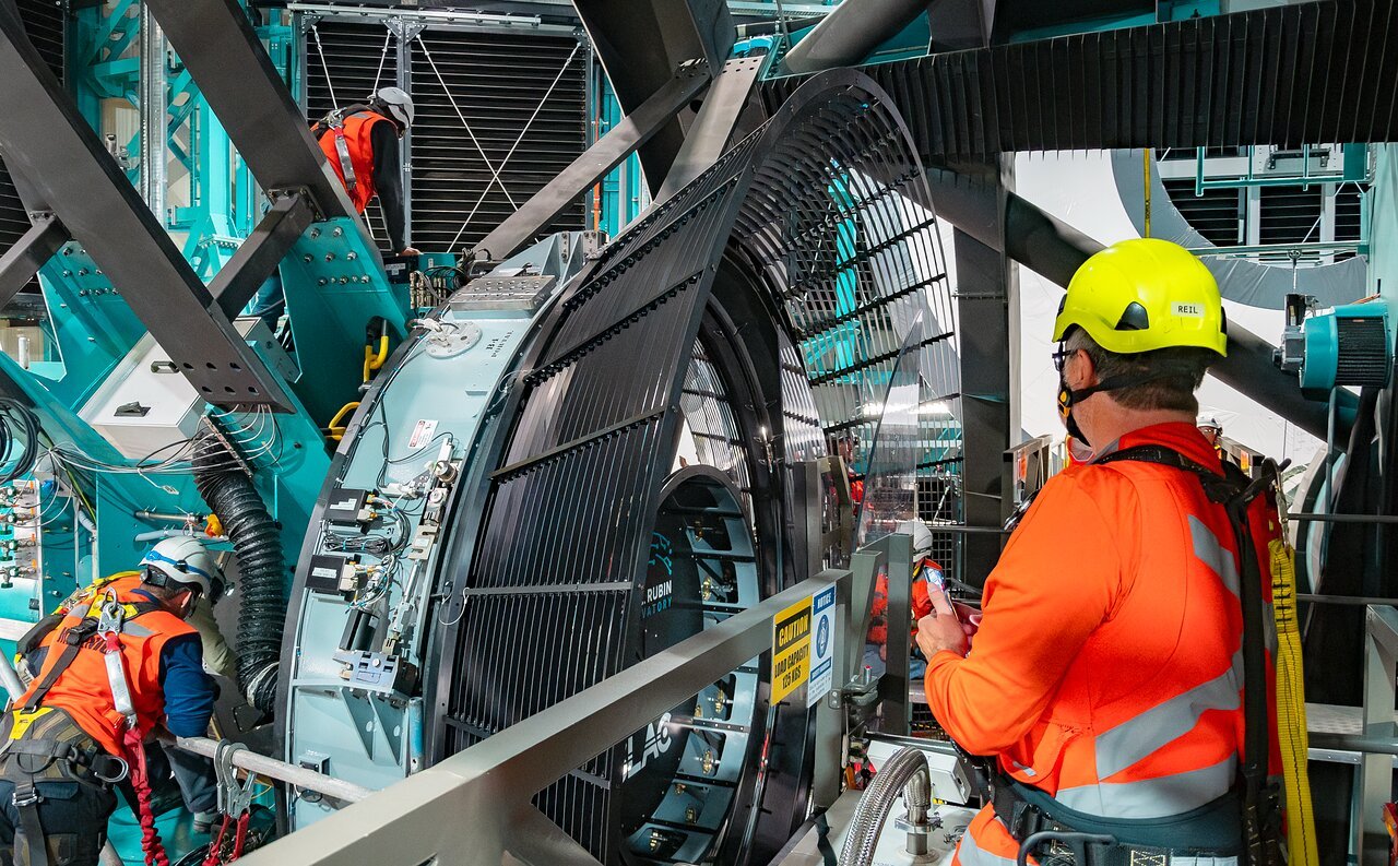 <p>The <a href="https://rubinobservatory.org/">NSF–DOE Vera C. Rubin Observatory</a> team installing the <a href="https://rubinobservatory.org/explore/how-rubin-works/technology/camera">LSST Camera</a> on the <a href="https://noirlab.edu/public/programs/vera-c-rubin-observatory/simonyi-survey-telescope/">Simonyi Survey Telescope</a> in March 2025.</p>